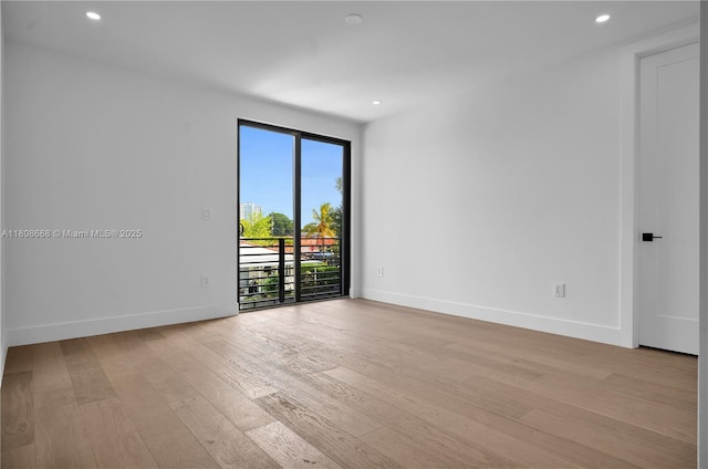 2839 SW 25th St, Miami, FL 33133 - empty room with light wood-style flooring, baseboards, and recessed lighting