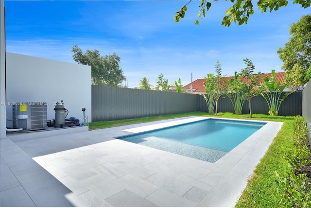2839 SW 25th St, Miami, FL 33133 - view of pool featuring central AC, a fenced backyard, and a patio area