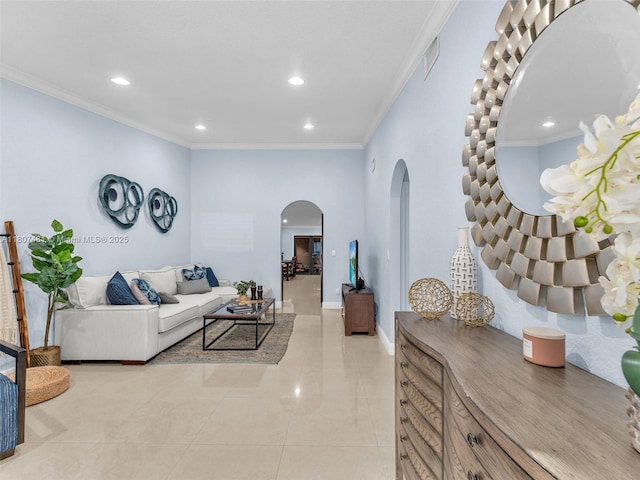 5650 W 21st Ave, Hialeah, FL 33016 - living area featuring arched walkways, ornamental molding, recessed lighting, light tile patterned floors, and baseboards