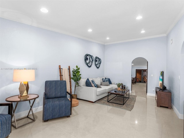 5650 W 21st Ave, Hialeah, FL 33016 - tiled living area featuring arched walkways, crown molding, recessed lighting, and baseboards