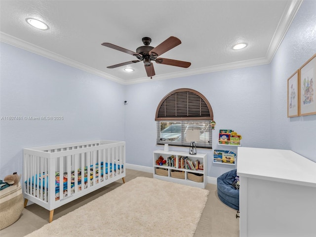 5650 W 21st Ave, Hialeah, FL 33016 - bedroom featuring crown molding, recessed lighting, a crib, and ceiling fan