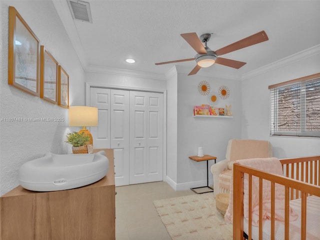 5650 W 21st Ave, Hialeah, FL 33016 - bedroom with ornamental molding, a closet, light tile patterned floors, a ceiling fan, and recessed lighting