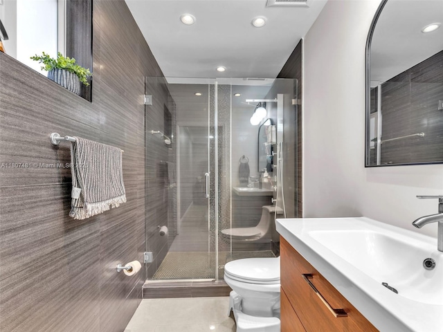 5650 W 21st Ave, Hialeah, FL 33016 - bathroom featuring toilet, vanity, tile patterned flooring, a stall shower, and recessed lighting
