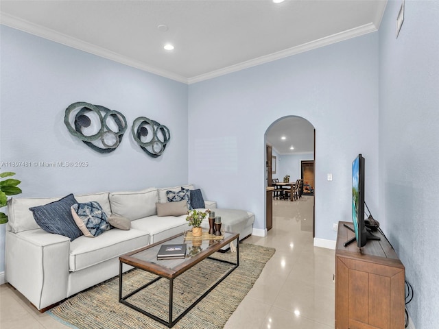 5650 W 21st Ave, Hialeah, FL 33016 - living room featuring arched walkways, crown molding, recessed lighting, baseboards, and light tile patterned floors