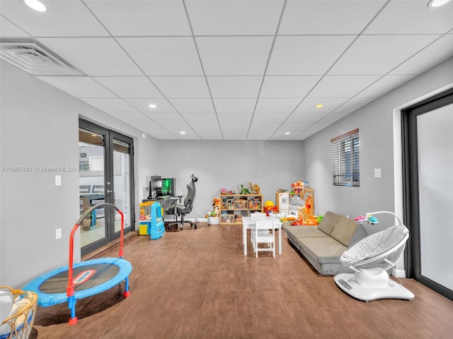 5650 W 21st Ave, Hialeah, FL 33016 - rec room with wood finished floors, recessed lighting, a drop ceiling, an office area, and baseboards