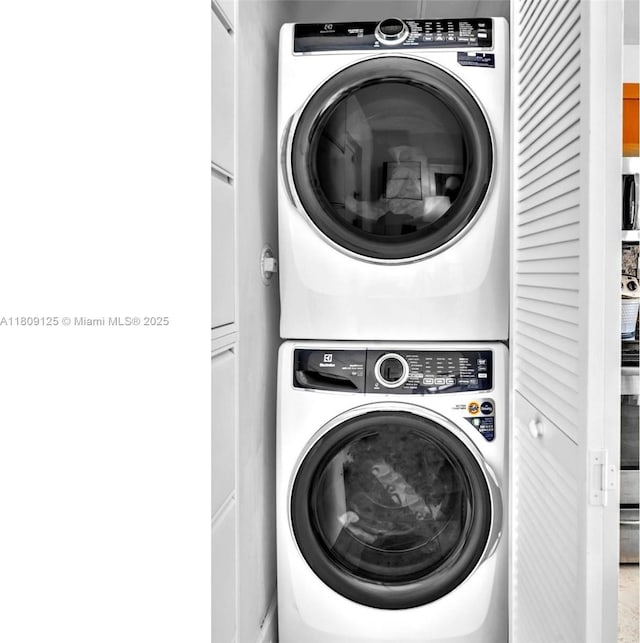 945 Michigan Ave Unit 8, Miami Beach, FL 33139 - washroom with estacked washer and dryer