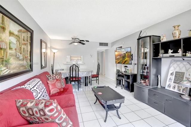 4441 NW 16th St Unit J108, Lauderhill, FL 33313 - living area with light tile patterned flooring and ceiling fan
