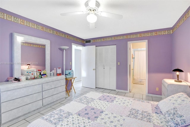 4441 NW 16th St Unit J108, Lauderhill, FL 33313 - bedroom featuring tile patterned flooring, ensuite bathroom, a ceiling fan, and a closet