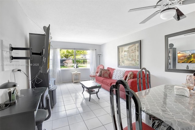 4441 NW 16th St Unit J108, Lauderhill, FL 33313 - dining space with a ceiling fan, light tile patterned flooring, and a textured ceiling
