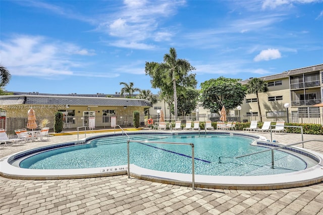 4441 NW 16th St Unit J108, Lauderhill, FL 33313 - community pool featuring a patio area