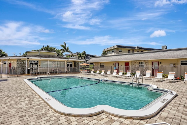 4441 NW 16th St Unit J108, Lauderhill, FL 33313 - community pool with a patio