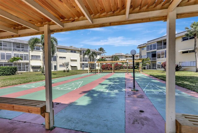 4441 NW 16th St Unit J108, Lauderhill, FL 33313 - view of community with a lawn, shuffleboard, and a residential view