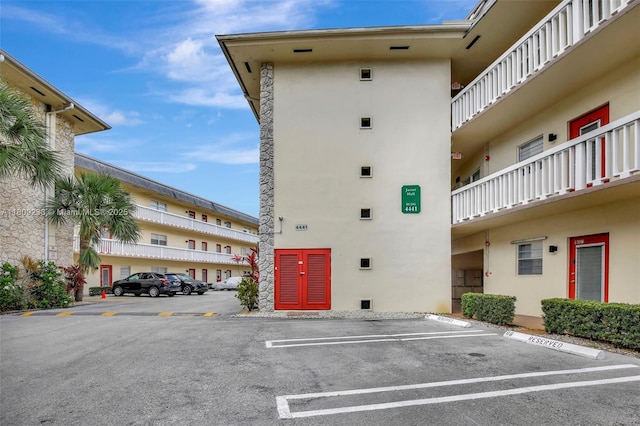 4441 NW 16th St Unit J108, Lauderhill, FL 33313 - view of apartment building / complex featuring uncovered parking