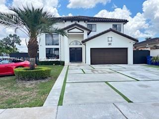 3801 SW 149th Ave, Miami, FL 33185 - view of front of property featuring concrete driveway and stucco siding