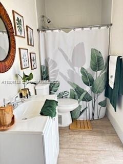 3801 SW 149th Ave, Miami, FL 33185 - bathroom featuring toilet, vanity, and curtained shower