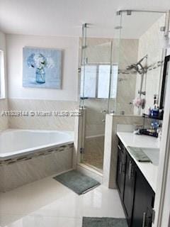 3801 SW 149th Ave, Miami, FL 33185 - full bath with vanity, a bath, a stall shower, and tile patterned flooring