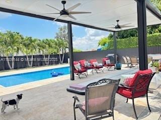 3801 SW 149th Ave, Miami, FL 33185 - view of swimming pool with ceiling fan and a patio