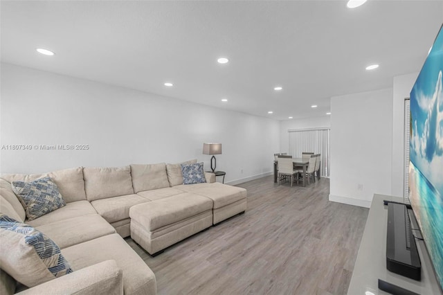 1356 Pelican Ct, Homestead, FL 33035 - living room featuring recessed lighting, wood finished floors, and baseboards
