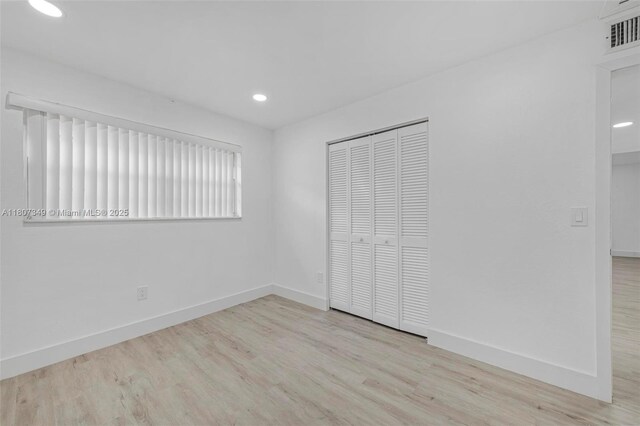 1356 Pelican Ct, Homestead, FL 33035 - unfurnished bedroom with wood finished floors, a closet, recessed lighting, and baseboards