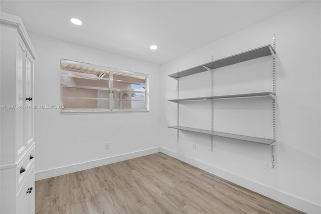 1356 Pelican Ct, Homestead, FL 33035 - spare room featuring baseboards, light wood-style floors, and recessed lighting