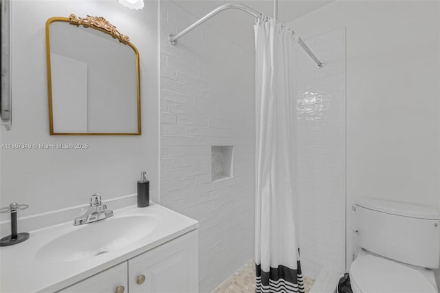 1356 Pelican Ct, Homestead, FL 33035 - bathroom with vanity, toilet, and a tile shower