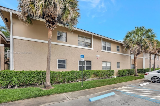 826 Twin Lakes Dr Unit 18-D, Coral Springs, FL 33071 - view of property with uncovered parking