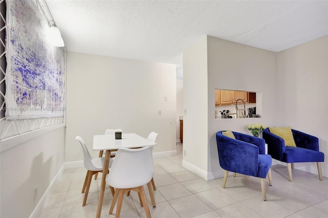 826 Twin Lakes Dr Unit 18-D, Coral Springs, FL 33071 - dining room with a textured ceiling and light tile patterned floors
