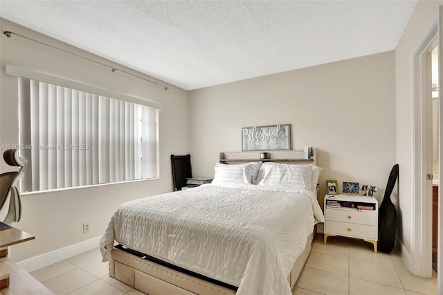 826 Twin Lakes Dr Unit 18-D, Coral Springs, FL 33071 - bedroom featuring light tile patterned flooring and baseboards