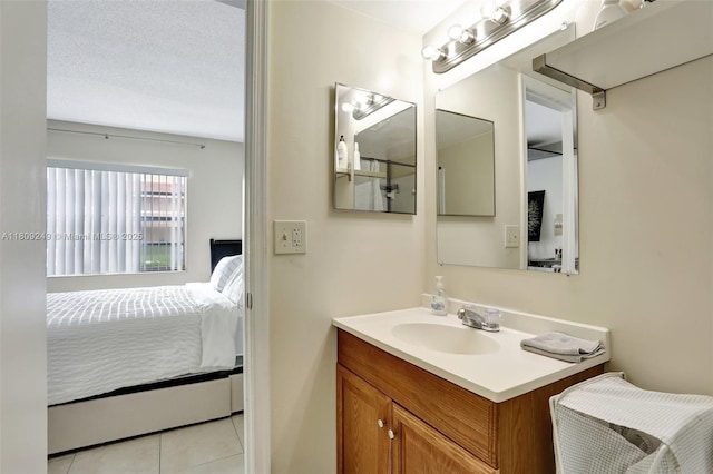 826 Twin Lakes Dr Unit 18-D, Coral Springs, FL 33071 - bathroom with ensuite bath, vanity, and tile patterned flooring