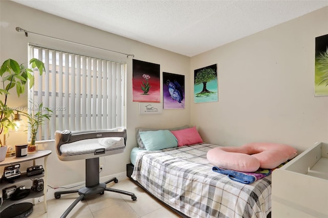 826 Twin Lakes Dr Unit 18-D, Coral Springs, FL 33071 - bedroom with tile patterned floors and a textured ceiling