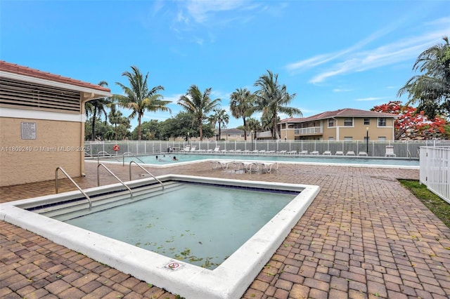 826 Twin Lakes Dr Unit 18-D, Coral Springs, FL 33071 - community pool featuring a patio area