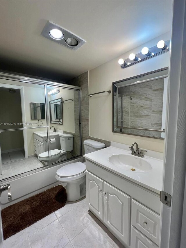 4545 Luxemburg Ct Unit 103, Lake Worth, FL 33467 - bathroom featuring vanity, toilet, and a shower