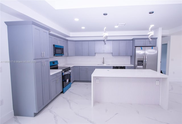 1023 Pilgrim, Lehigh Acres, FL 33974 - kitchen with appliances with stainless steel finishes, a sink, light marble finish flooring, pendant lighting, and recessed lighting
