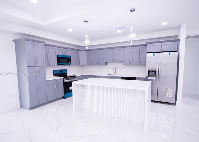 1023 Pilgrim, Lehigh Acres, FL 33974 - kitchen with appliances with stainless steel finishes, light countertops, gray cabinetry, a sink, and light marble finish flooring