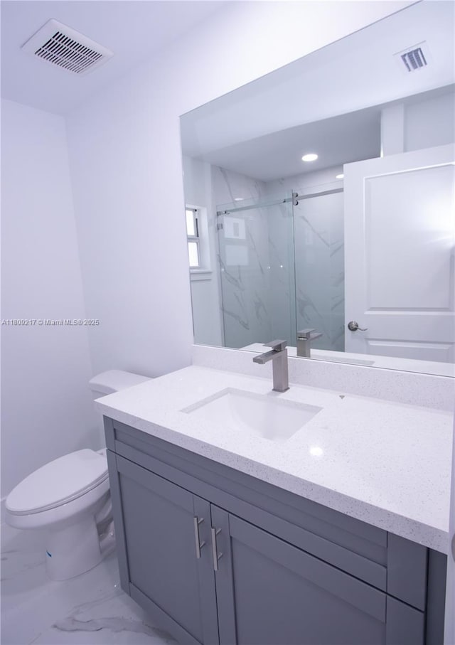 1023 Pilgrim, Lehigh Acres, FL 33974 - full bathroom with vanity, marble finish flooring, a marble finish shower, toilet, and recessed lighting