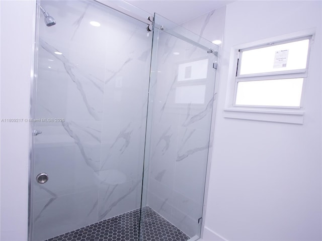 1023 Pilgrim, Lehigh Acres, FL 33974 - bathroom featuring a marble finish shower