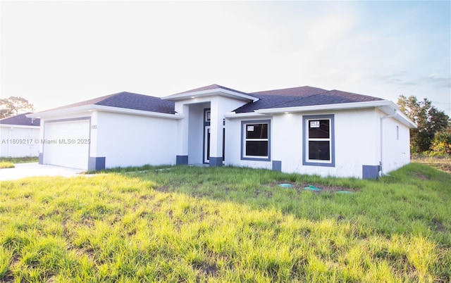 1023 Pilgrim, Lehigh Acres, FL 33974 - single story home featuring an attached garage, stucco siding, driveway, and a shingled roof