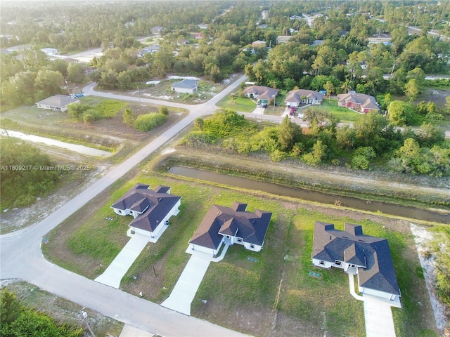 1023 Pilgrim, Lehigh Acres, FL 33974 - aerial view of property's location with nearby suburban area
