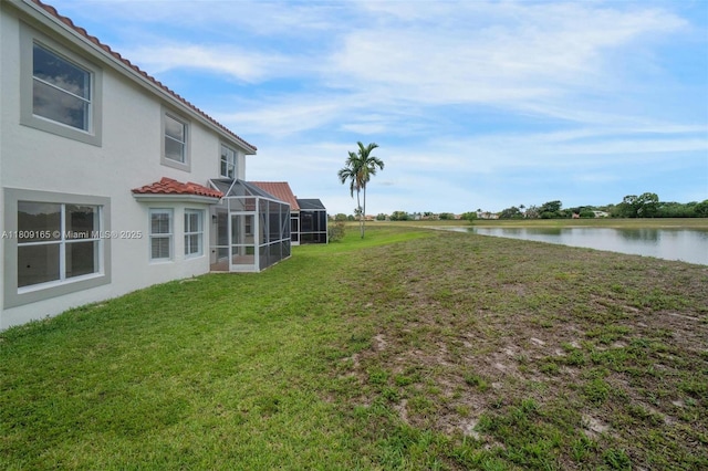 10728 Oak Lake Way, Boca Raton, FL 33498 - view of grassy yard with a water view and a lanai