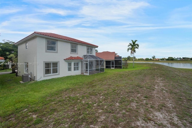10728 Oak Lake Way, Boca Raton, FL 33498 - back of property featuring a water view, stucco siding, and a yard
