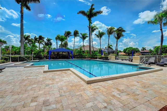 19401 Preserve Dr, Boca Raton, FL 33498 - community pool featuring a patio area