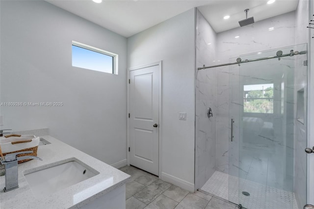 2008 Hercules Rd, La Belle, FL 33935 - full bathroom featuring a marble finish shower, double vanity, recessed lighting, and baseboards
