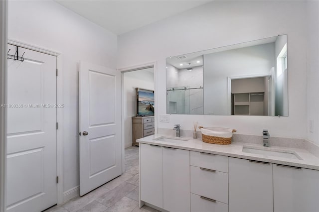 2008 Hercules Rd, La Belle, FL 33935 - full bathroom with a shower stall, double vanity, and baseboards