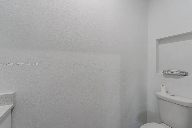 2008 Hercules Rd, La Belle, FL 33935 - bathroom featuring toilet and vanity