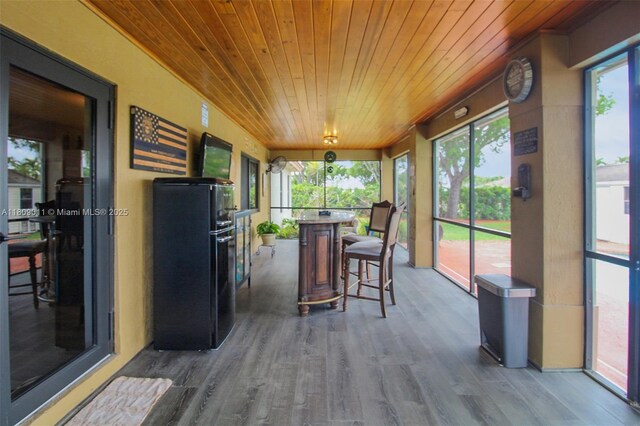 17375 SW 282nd St, Homestead, FL 33030 - sunroom / solarium with wooden ceiling, wood finished floors, and plenty of natural light