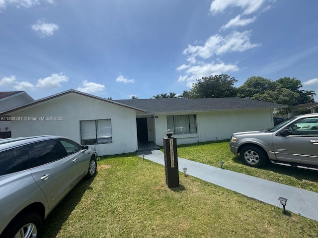 13320 SW 99th St, Miami, FL 33186 - view of front of home with a front lawn