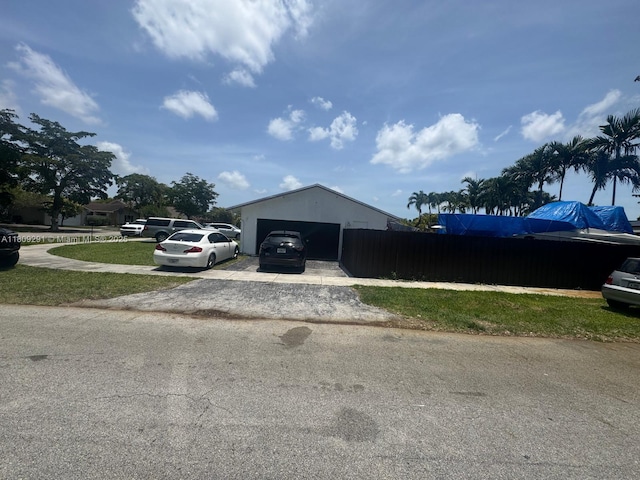 13320 SW 99th St, Miami, FL 33186 - view of front of house featuring a garage and driveway