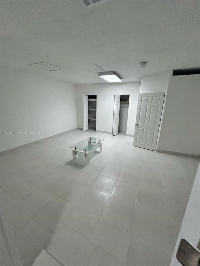 13320 SW 99th St, Miami, FL 33186 - below grade area featuring light tile patterned flooring