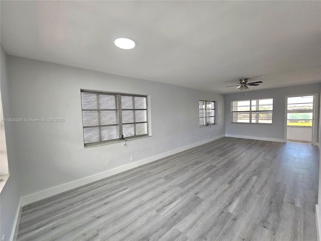 1490 NW 43rd Ave Unit 301, Lauderhill, FL 33313 - spare room featuring ceiling fan, baseboards, and wood finished floors