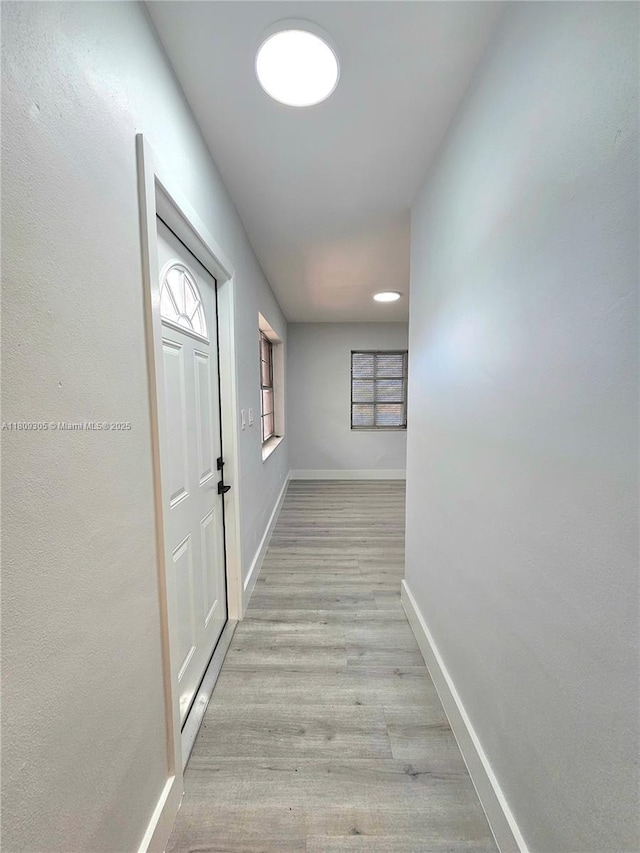 1490 NW 43rd Ave Unit 301, Lauderhill, FL 33313 - hall with wood finished floors and baseboards